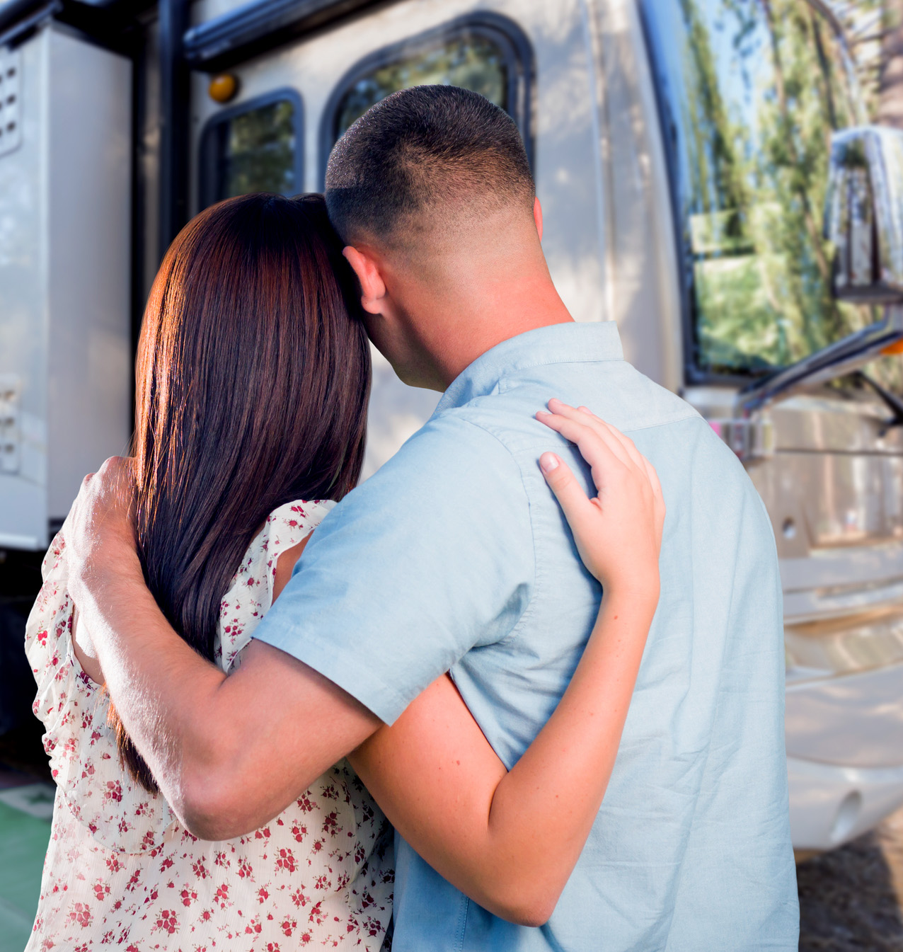 Young couple looking at a new motorhome after receiving thorough rv inspection