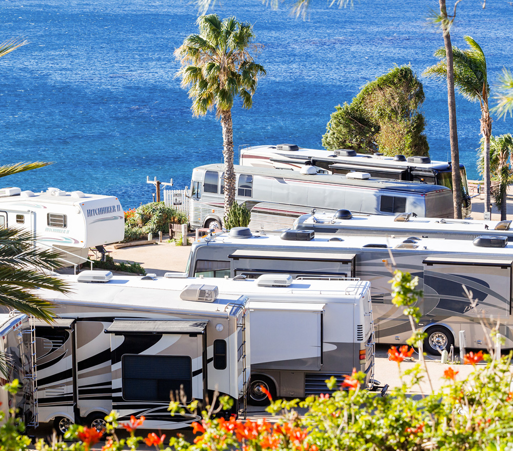 Motorhome driving on a Rocky Mountain road after an RV inspection